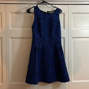 Animal print fit and flare peplum dress